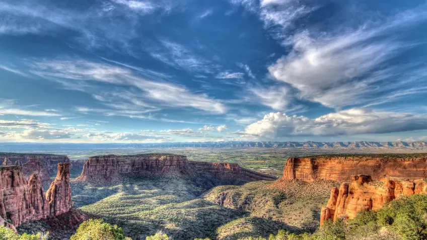Colorado National Monument canyons above the Redlands, with the Grand Valley beyond